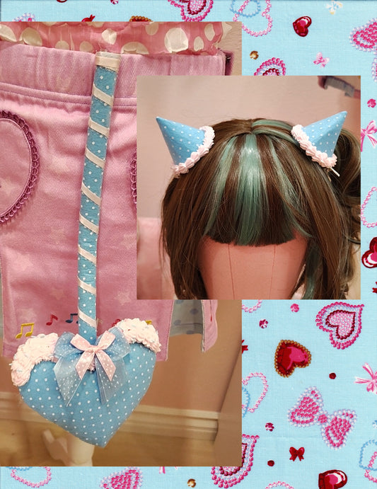 Collage of blue devil tail accessory with white polkadots and heart tip, with silver ribbon and decoden cream, and matching devil horn hair clips.