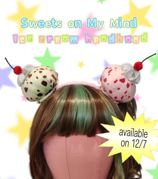 Ice cream-themed headband on a mannequin head with colorful text and stars in the background.
